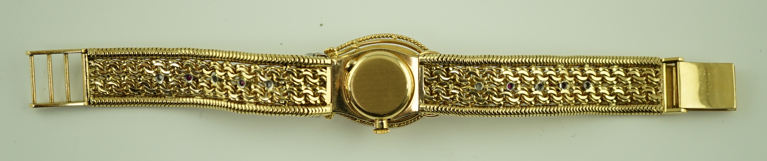 A lady's 18ct gold, ruby and diamond cluster set Rolex manual wind cocktail watch